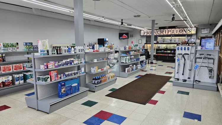 Pharmacist Matt Marinco helping a patient.